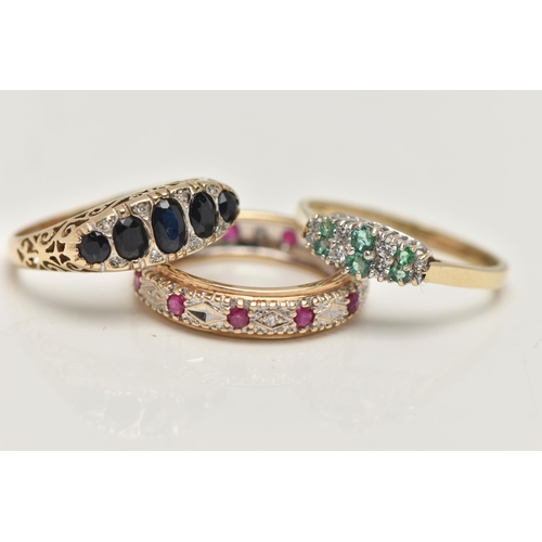 44 - THREE 9CT GOLD GEM SET RINGS, to include a blue sapphire and diamond boat ring, hallmarked 9ct Sheff... 