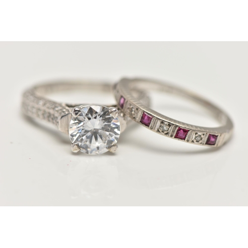 54 - TWO WHITE METAL RINGS, the first a ruby and diamond half eternity ring, stamped 18ct, ring size L, a... 