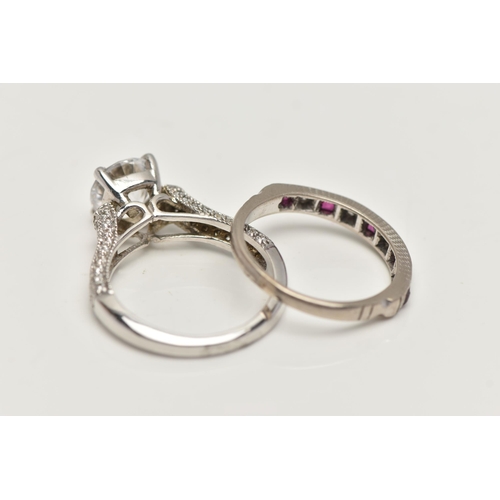 54 - TWO WHITE METAL RINGS, the first a ruby and diamond half eternity ring, stamped 18ct, ring size L, a... 