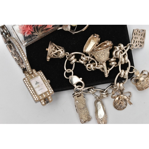 64 - AN ASSORTMENT OF WHITE METAL JEWELLERY,  to include a withe metal charm bracelet, fitted with a lobs... 