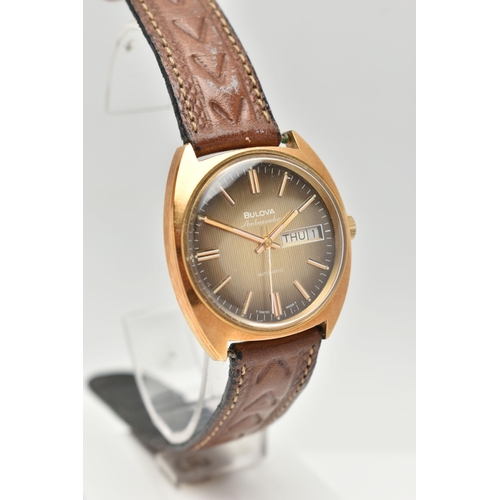 72 - AN AUTOMATIC BULOVA AMBASSADOR, textured ombre dial with gold baton markers, day-date function at th... 