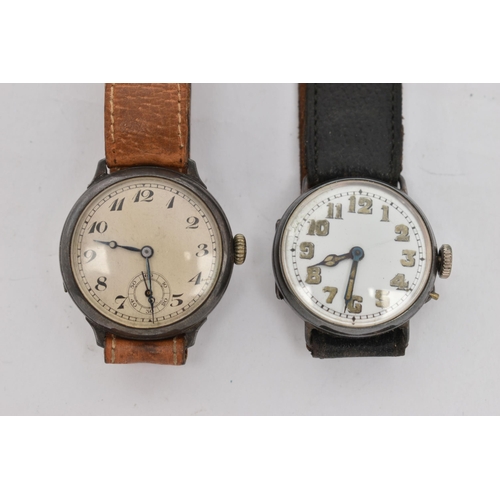 82 - TWO EARLY/MID 20TH CENTURY SILVER WRISTWATCHES, the first with manual wind movement, round white dia... 