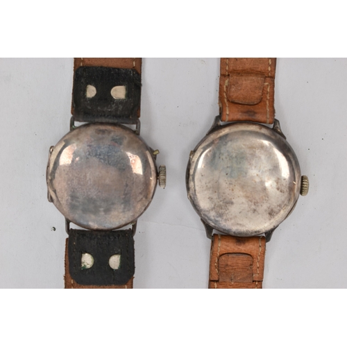 82 - TWO EARLY/MID 20TH CENTURY SILVER WRISTWATCHES, the first with manual wind movement, round white dia... 