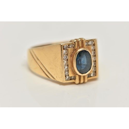 90 - A GENTS YELLOW METAL SAPPHIRE AND DIAMOND SIGNET RING, set with a central oval cut blue sapphire col... 