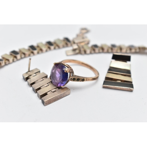 97 - A 9CT GOLD SYNTHETIC SAPPHIRE RING AND A MATCHING SILVER NECKLACE AND EARRING SET, circular cut synt... 