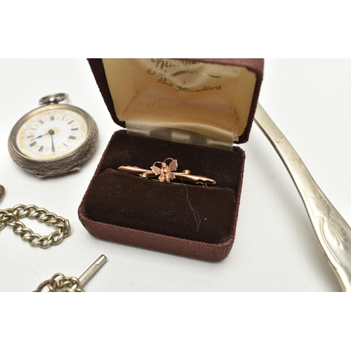 176 - A BOX OF ASSORTED ITEMS, to include a rose metal butterfly brooch, stamped 9ct, a white metal ladys ... 