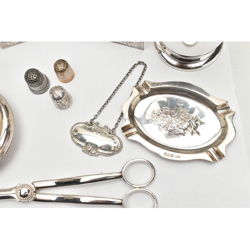 204 - A SMALL PARCEL OF 20TH CENTURY SILVER AND PLATE, the silver comprising a silver strainer in the form... 