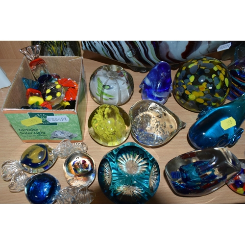 355 - A LARGE QUANTITY OF GLASS PAPERWEIGHTS AND STUDIO GLASS FIGURES, comprising a clear, white and gold ... 