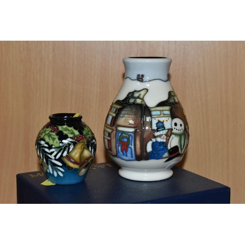 358 - A BOXED MOORCROFT 'CHRISTMAS MORNING' VASE, together with a miniature 'Deck The Bells' pattern vase ... 