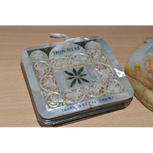 359 - A CARVED SHELL AND MOTHER OF PEARL CIGARETTE CASE, the hand carved shell has a detailed nativity sce... 