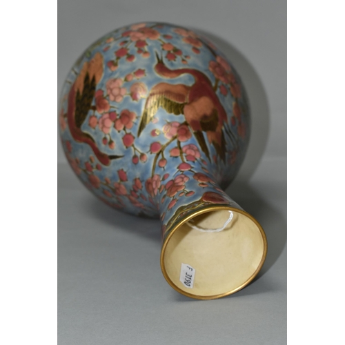 368 - AN ORIENTAL VASE, decorated with pink cranes and blossom on a pale blue ground, outlined in gold gil... 