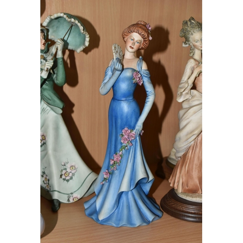 370 - A GROUP OF CAPODIMONTE FIGURES, together with a large Lladro 'Lady with shawl' 4914 figure, height 4... 