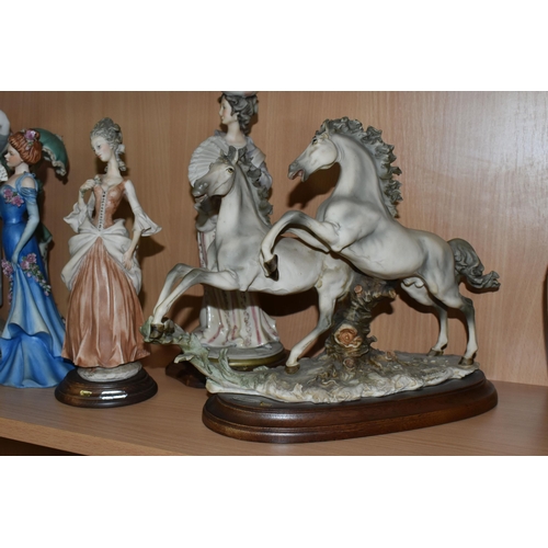 370 - A GROUP OF CAPODIMONTE FIGURES, together with a large Lladro 'Lady with shawl' 4914 figure, height 4... 