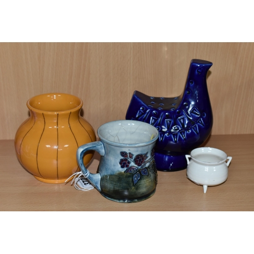 372 - A GROUP OF MOORCROFT POTTERY, comprising a 'Bramble' design mug (cracked and crazed), a Pumpkin vase... 