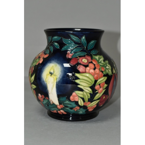 384 - A MOORCROFT POTTERY LIMITED EDITION 'GUIDING LIGHT' VASE, numbered 32/50, tube lined with candles, h... 