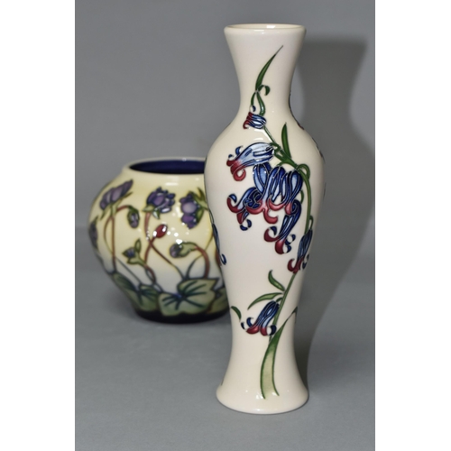 385 - TWO MOORCROFT POTTERY VASES, comprising a bulbous vase in the 'Hepatica' pattern, tube lined with li... 