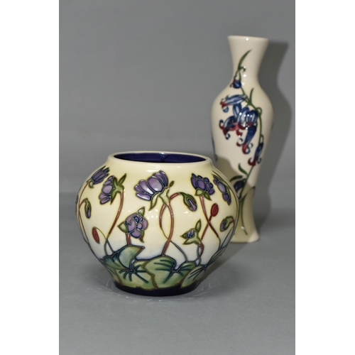 385 - TWO MOORCROFT POTTERY VASES, comprising a bulbous vase in the 'Hepatica' pattern, tube lined with li... 