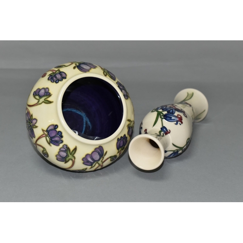 385 - TWO MOORCROFT POTTERY VASES, comprising a bulbous vase in the 'Hepatica' pattern, tube lined with li... 