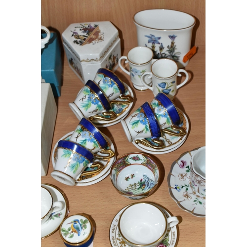 387 - A COLLECTION OF MINIATURE CUPS AND SAUCERS, ETC, to include boxed teacups in Royal Albert Old Countr... 