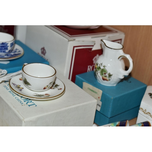 387 - A COLLECTION OF MINIATURE CUPS AND SAUCERS, ETC, to include boxed teacups in Royal Albert Old Countr... 