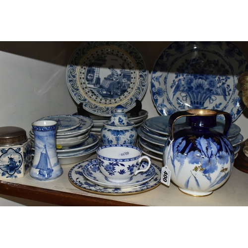 400 - A GROUP OF ENGLISH AND CONTINENTAL BLUE AND WHITE CERAMICS, to include a Doulton Burslem twin handle... 