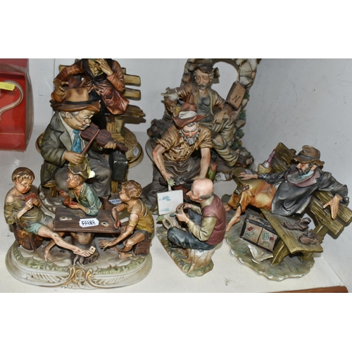 401 - TWO CAPODIMONTE FIGURES AND FIVE SIMILAR FIGURES, to include a Capodimonte figure of a tramp cooking... 