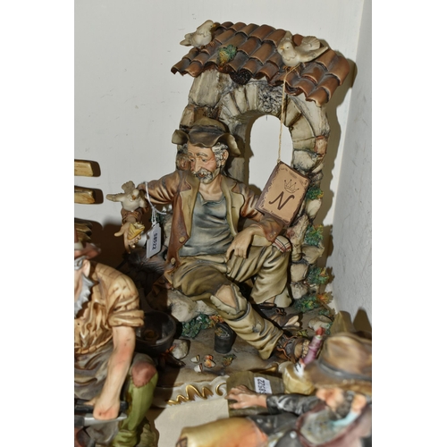 401 - TWO CAPODIMONTE FIGURES AND FIVE SIMILAR FIGURES, to include a Capodimonte figure of a tramp cooking... 