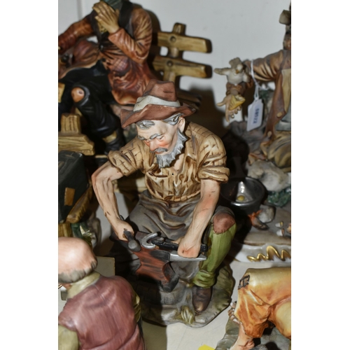 401 - TWO CAPODIMONTE FIGURES AND FIVE SIMILAR FIGURES, to include a Capodimonte figure of a tramp cooking... 