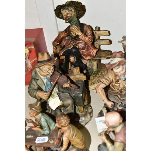 401 - TWO CAPODIMONTE FIGURES AND FIVE SIMILAR FIGURES, to include a Capodimonte figure of a tramp cooking... 