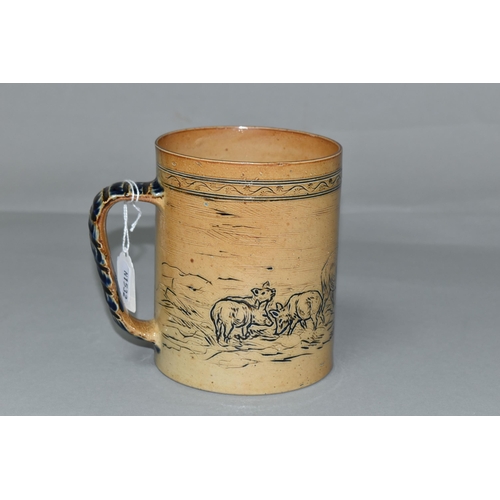 403 - A DOULTON LAMBETH STONEWARE TANKARD BY HANNAH BARLOW, incised with pigs and piglets beneath a foliat... 