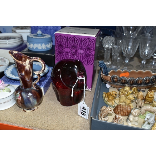 415 - A GROUP OF CERAMIC ORNAMENTS AND GLASSWARE, comprising a boxed Wedgwood red glass elephant, eight bo... 