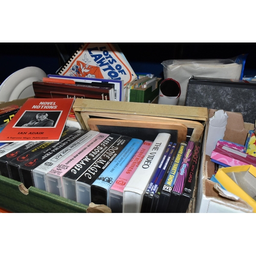 419 - SIX BOXES OF MAGICIANS EQUIPMENT, BOOKS AND VIDEOS, to include a collection of chess and domino sets... 