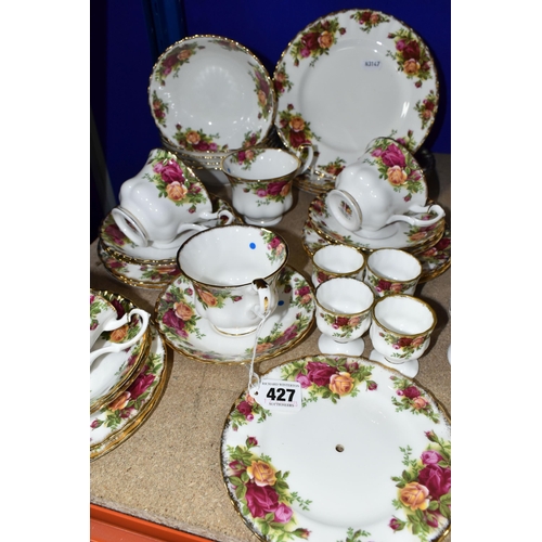 427 - TWO ROYAL ALBERT TEA SETS, 'MEMORY LANE' AND 'OLD COUNTRY ROSES' PATTERNS, comprising eight cups, fi... 