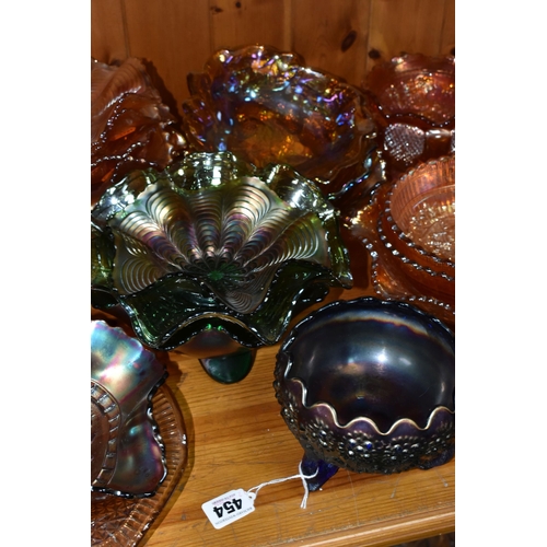 454 - A COLLECTION OF CARNIVAL GLASS, over forty pieces to include a punch bowl and cups, bowls, jugs, and... 