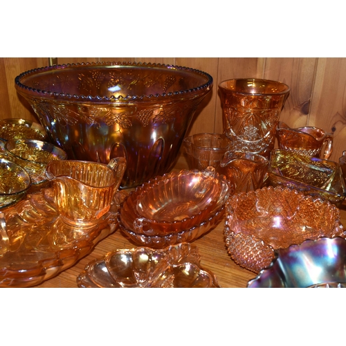 454 - A COLLECTION OF CARNIVAL GLASS, over forty pieces to include a punch bowl and cups, bowls, jugs, and... 