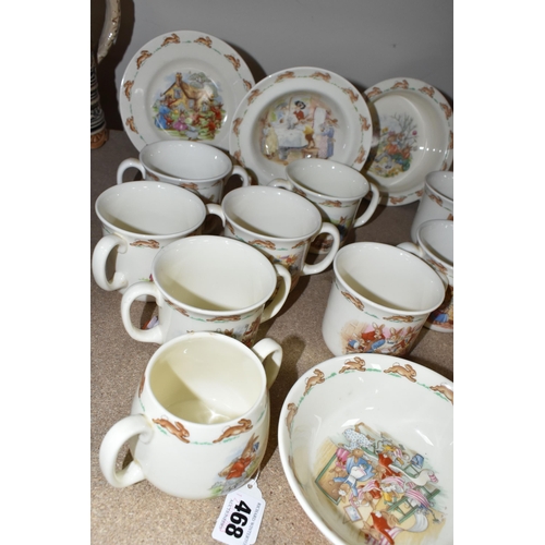 468 - A COLLECTION OF ROYAL DOULTON BUNNYKINS NURSERY WARE, twenty four pieces to include seven twin handl... 