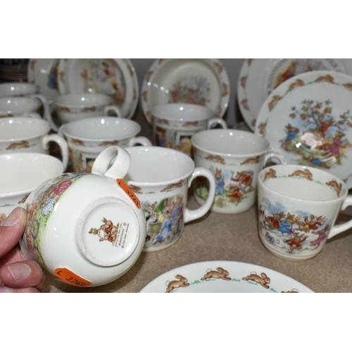 468 - A COLLECTION OF ROYAL DOULTON BUNNYKINS NURSERY WARE, twenty four pieces to include seven twin handl... 