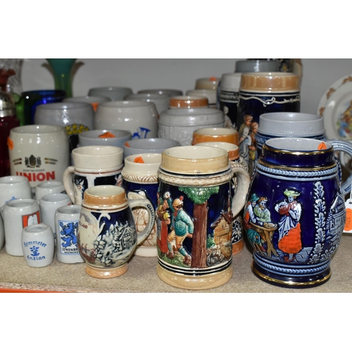 469 - A COLLECTION OF STEINS AND CERAMIC TANKARDS, thirty two pieces to include salt glazed stoneware exam... 