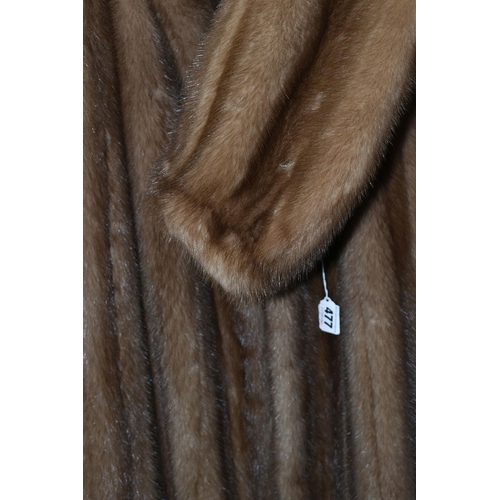 477 - A LADIES  MID LENGTH FUR COAT, pastel brown, maker's name Subhashini, approximate UK size 12 (1) (Co... 