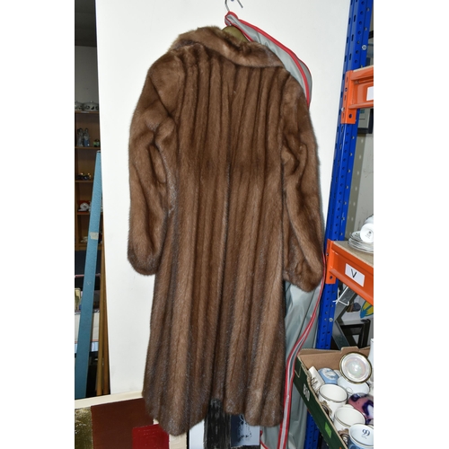 477 - A LADIES  MID LENGTH FUR COAT, pastel brown, maker's name Subhashini, approximate UK size 12 (1) (Co... 