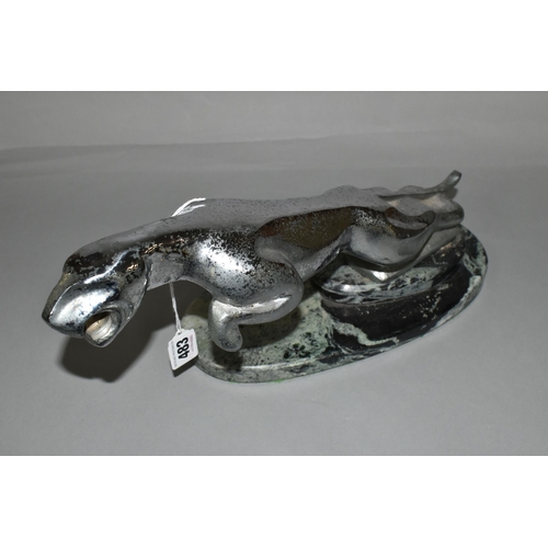 483 - AN ART DECO STYLE CHROME LEAPING JAGUAR, mounted on a green and black marble plinth, length includin... 