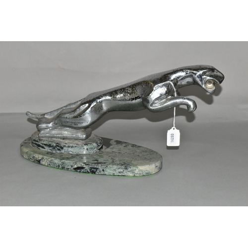 483 - AN ART DECO STYLE CHROME LEAPING JAGUAR, mounted on a green and black marble plinth, length includin... 