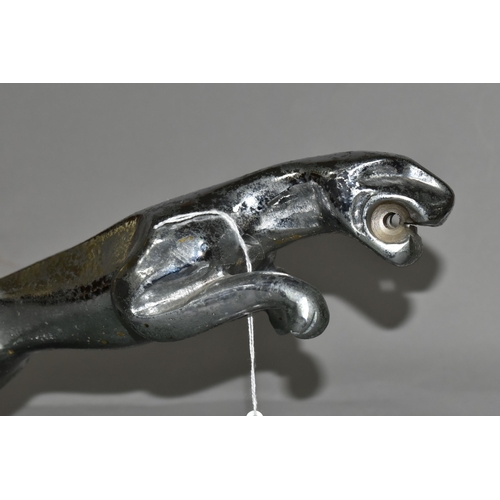 483 - AN ART DECO STYLE CHROME LEAPING JAGUAR, mounted on a green and black marble plinth, length includin... 