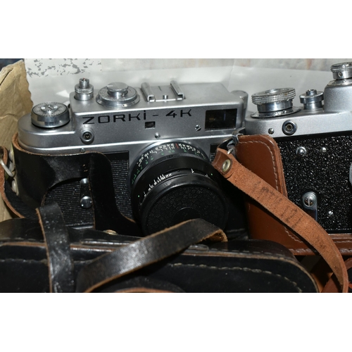 496 - A TRAY CONTAINING VINTAGE FILM CAMERAS comprising of a Zorki 4K fitted with a Jupiter 8 50mm f2 lens... 