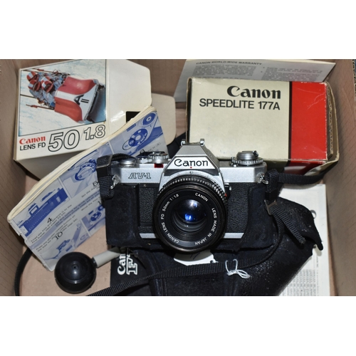 499 - A CANON AV-1 FILM SLR CAMERA, a boxed FD 50mm f1.8 lens, a Speedlite 177A etc