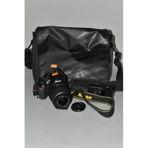 501 - A NIKON D3100 DIGITAL SLR CAMERA fitted with a DF-S DX Nikkor 18-55mm f3.5 lens, one battery and cha... 