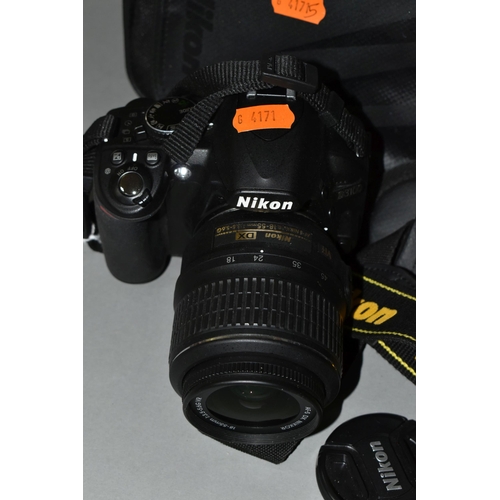 501 - A NIKON D3100 DIGITAL SLR CAMERA fitted with a DF-S DX Nikkor 18-55mm f3.5 lens, one battery and cha... 