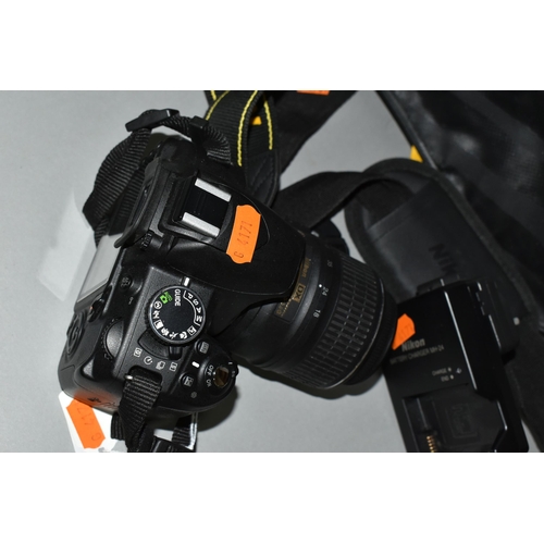 501 - A NIKON D3100 DIGITAL SLR CAMERA fitted with a DF-S DX Nikkor 18-55mm f3.5 lens, one battery and cha... 