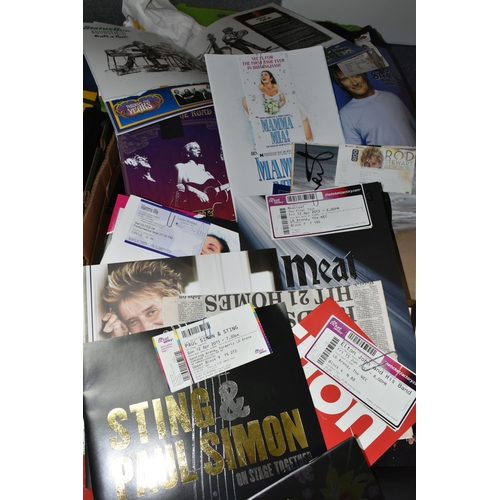 505 - TWO BOXES OF POP MUSIC MEMORABILIA to include a collection of 25 tour 'T' Shirts (appear unused) fro... 