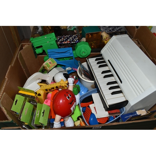 513 - FOUR BOXES OF TOYS AND SOUVENIR DOLLS, to include six Palitoy 'Pocketeers' games, a collection of tr... 